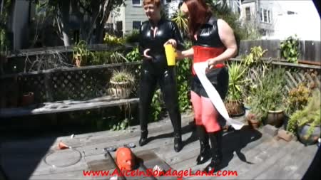 Sissy Shower Puddles Wetting Femdom Mistress Outdoor Latex Bdsm - Puddles the sissy bonus scene aliceinbondageland

mistress minax and I enjoy a sunny but windy day in kinky san francisco.

we are playing at the serious bondage institute so we enjoy taking advantage of their unique cement cell hidden in their deck.

metal restraints, heavy locks and heavy rubber are the flavors of the day so far but we taunt and humiliate our thirsty sissy with threats of what will happen to him once he is helpless.

earlier, we soaked our sissy in the center of a puddle but we cannot be sure if he ingested any of our nectar or not. Time for a funnel in this "bonus" threesome drinking scene featuring both mistress minax as a special femdom guest star.
